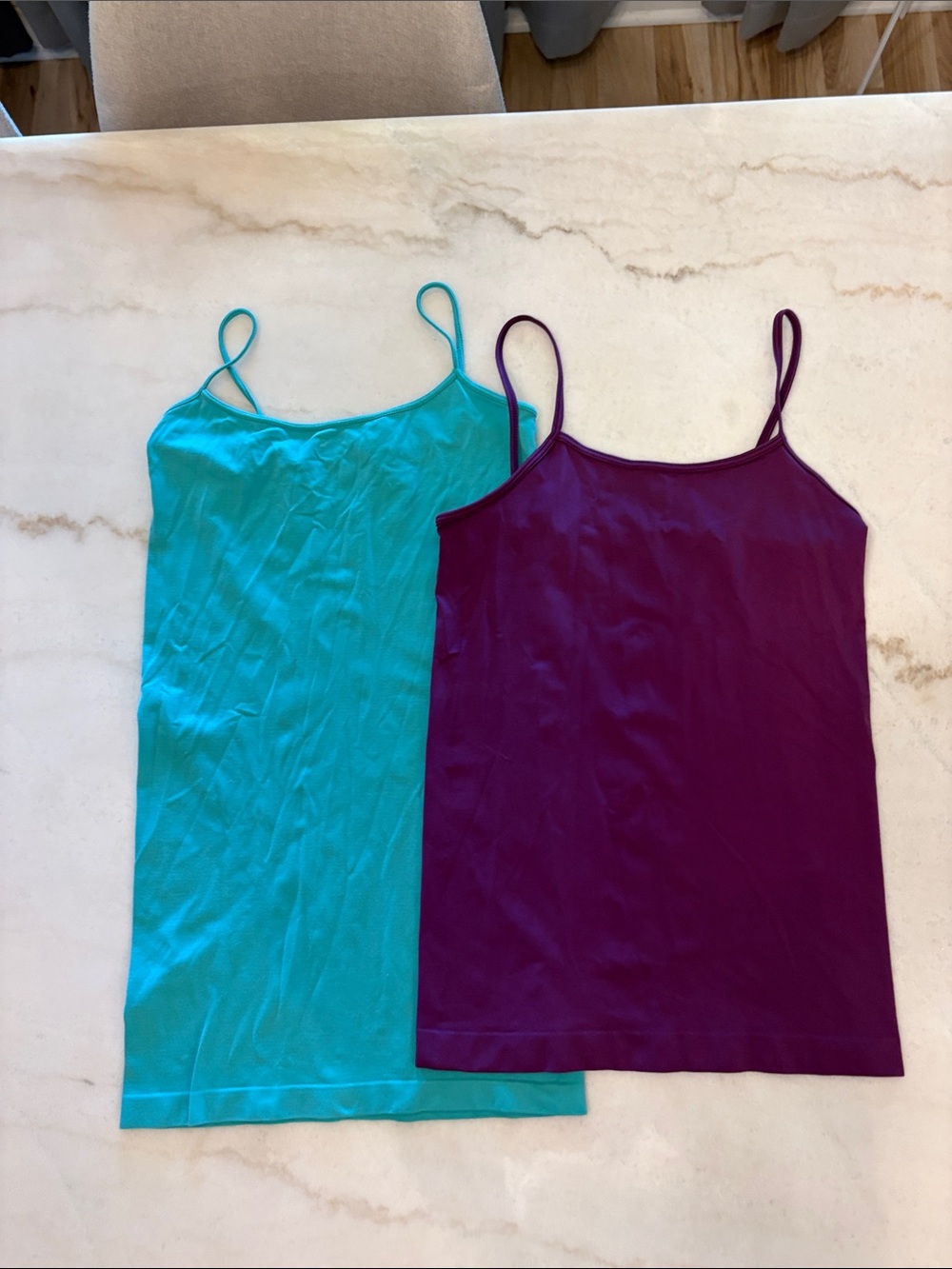 Lot of 2 lightweight stretchy spaghetti straps camisole tops.